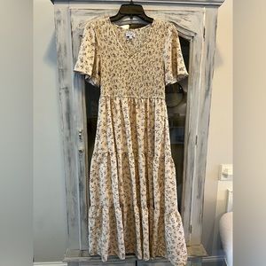 Beige dress with brown accents